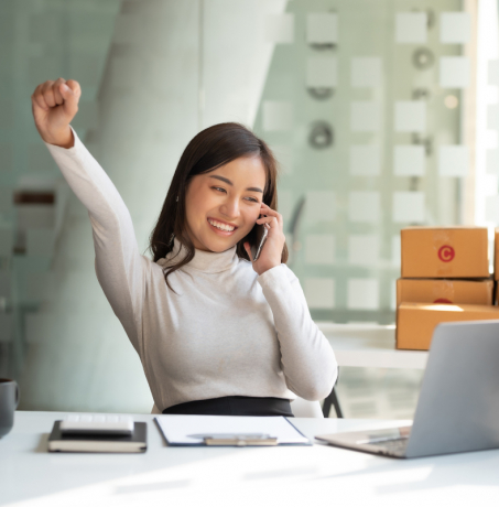 Benecard Young Asian Woman Cheering on Phone