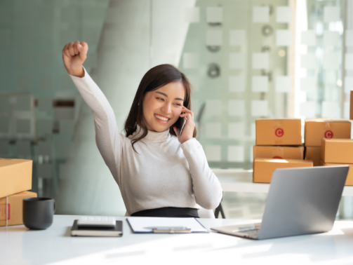 Benecard Young Asian Woman Cheering on Phone